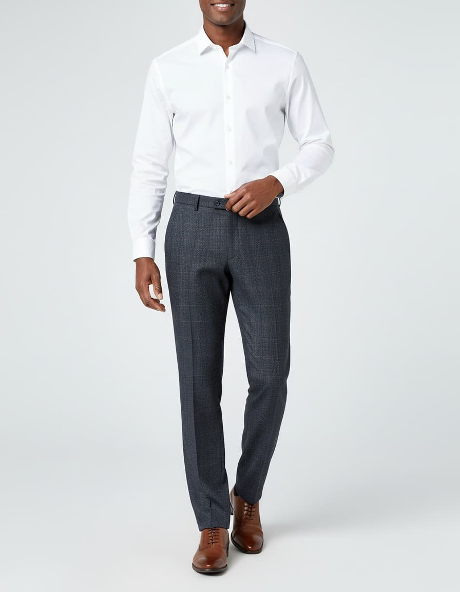 Pantalon tweedlook ruit blauw — op model